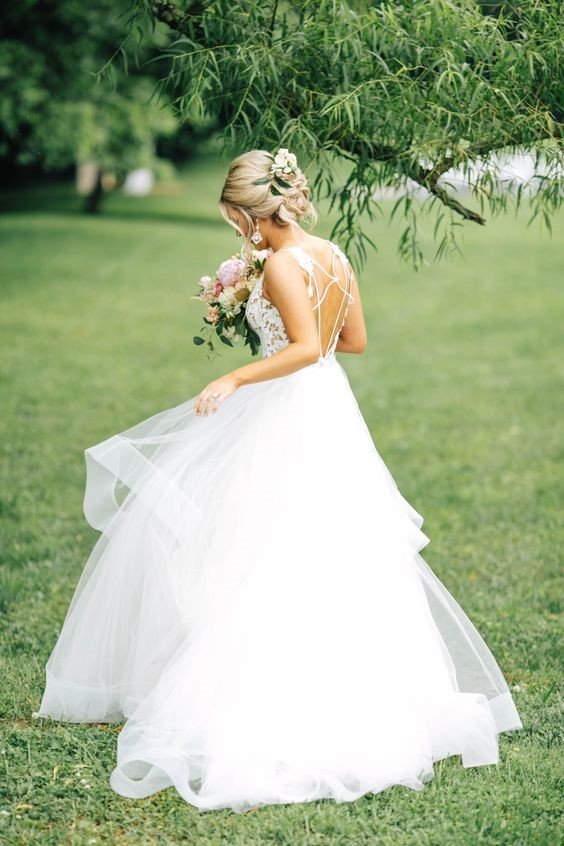 Girls in green wedding dress kissing, very long straight black hair, high  heels, front face, satin wide ball gown on Craiyon