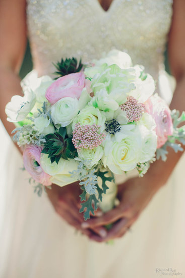 Bride with floral arrangement