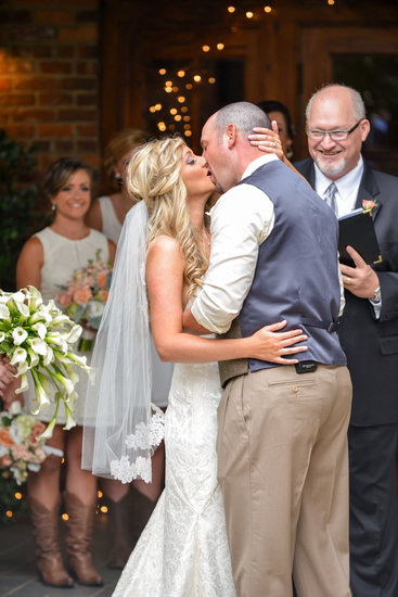 bride and groom kiss