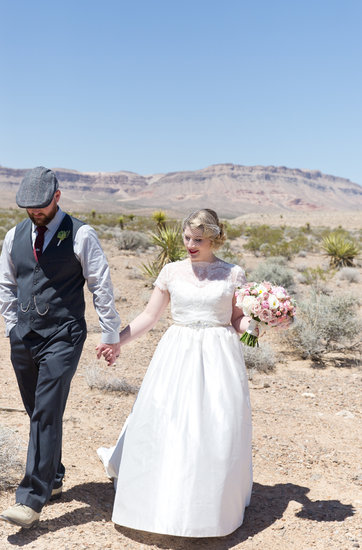 bride and groom in the dessert