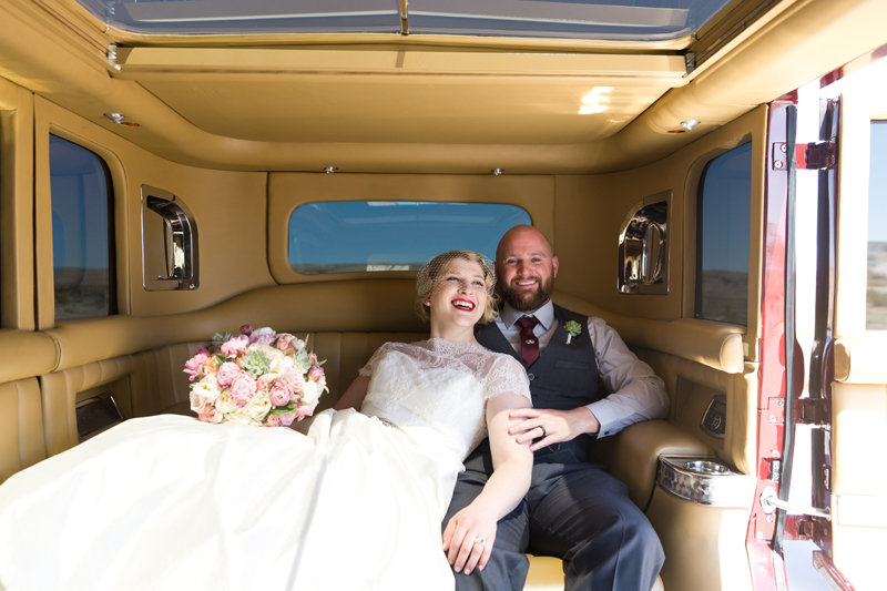 bride and groom sitting