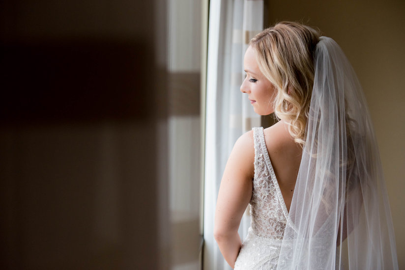 Bride looking out the Window
