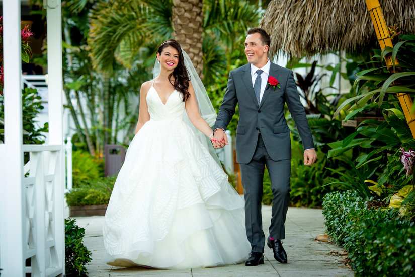 Bride and Groom Holding Hands