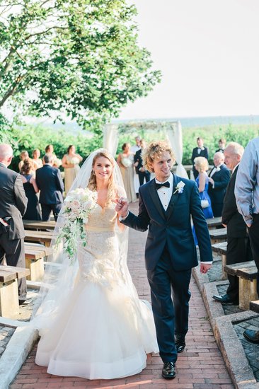 Bride and Groom Walking Down The Aisle