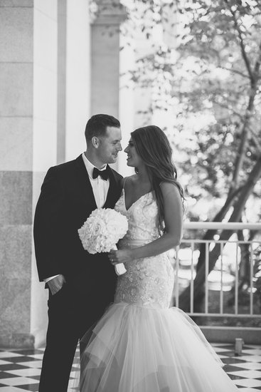 bride and groom looking at eachother