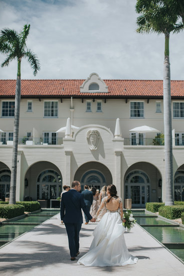 Newlywed stroll down the aisle together 