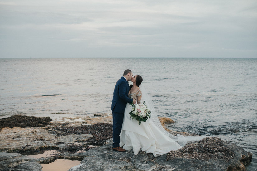 Who doesn't love romantic kisses on the beach during sunset?