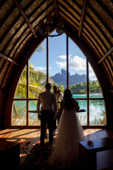 Bride and groom eloping in the chapel at the Four Seasons Bora Bora