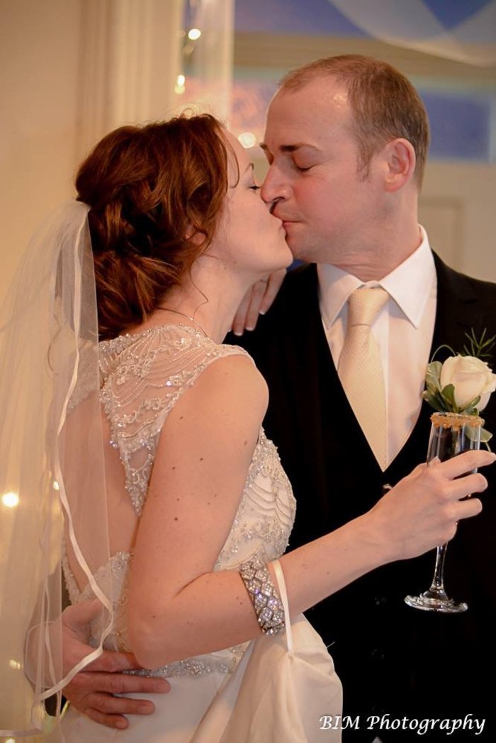 Bride & Groom Share A Kiss 