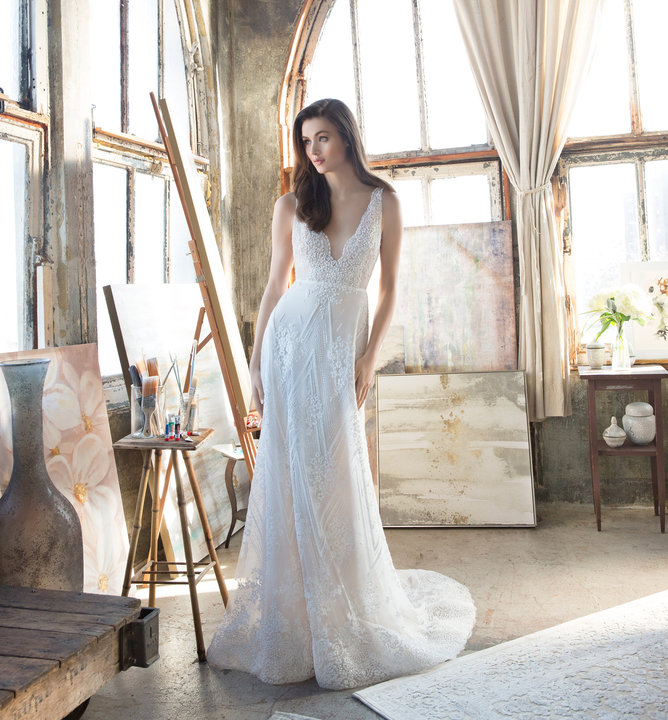 Style 2810 Tara Keely by Lazaro bridal gown - Ivory beaded floral and chevron modified A-line bridal gown, illusion V neckline, open back with dual crystal straps and chapel train.